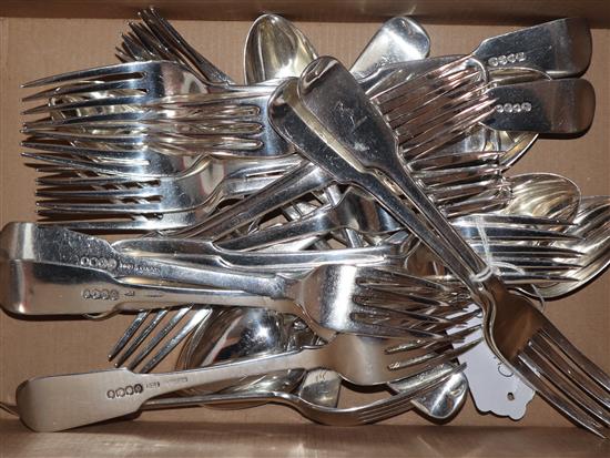 A harlequin part canteen of silver fiddle pattern flatware including eleven William IV Irish silver tableforks, Dublin, 1834